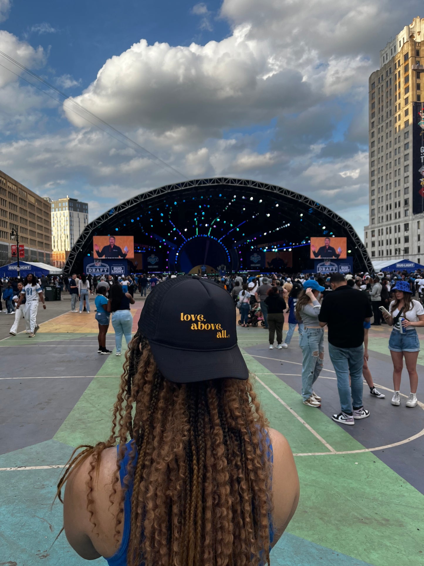 love above all trucker cap